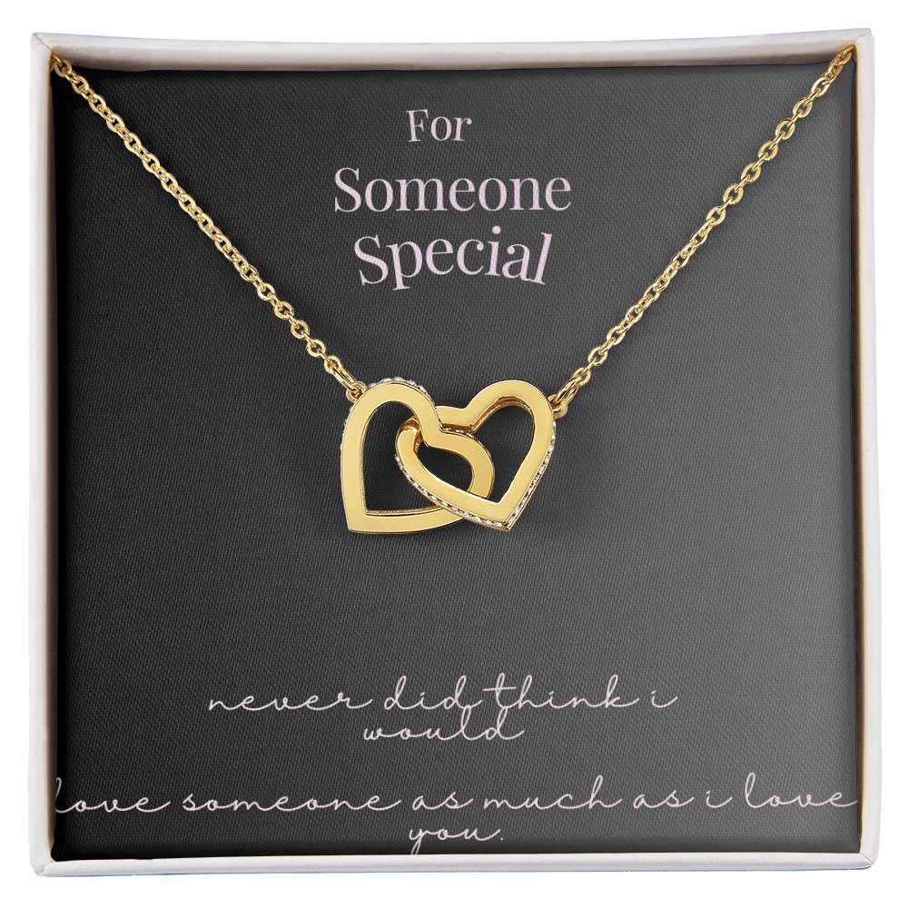 "Forever Linked: Interlocking Heart Charm"