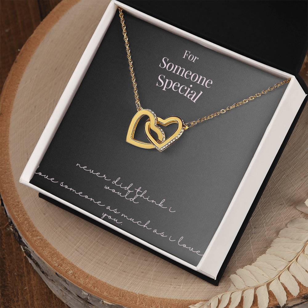 "Forever Linked: Interlocking Heart Charm"