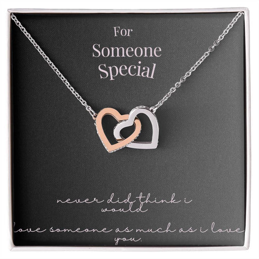 "Forever Linked: Interlocking Heart Charm"