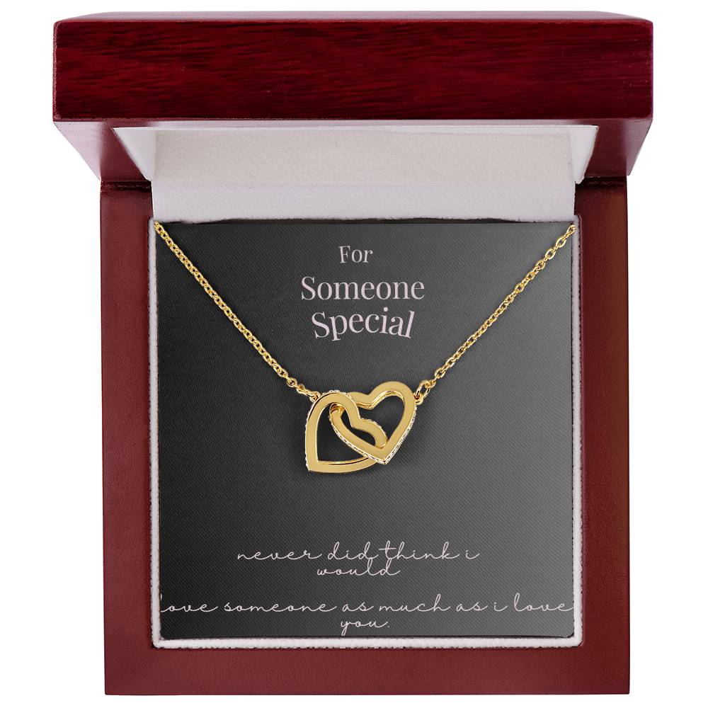 "Forever Linked: Interlocking Heart Charm"